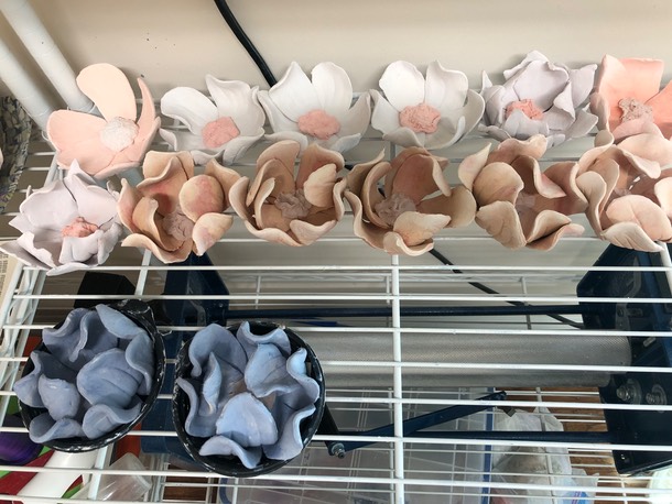 colored paper porcelain flowers drying